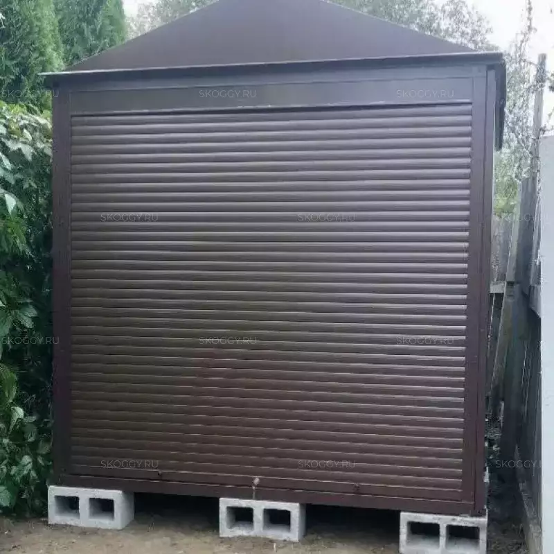 Хозблок для хранения в расцветке "под дерево" с рольставнями в пос. Первомайское, г. Москва