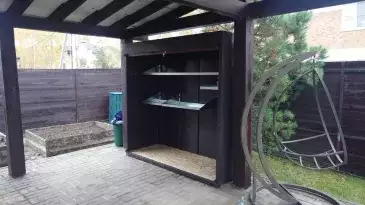 Роллетный шкаф для хранения вещей в серо-коричневом цвете в пос. Пестово, г.о. Мытищи, МО