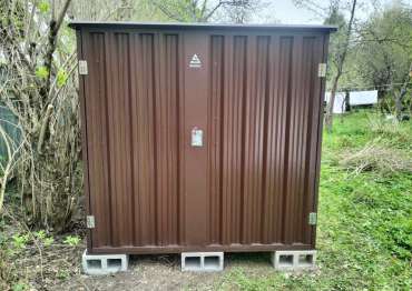 Современный хозблок для спортивного инвентаря и квадроцикла в шоколадно-коричневом цвете в с. Ромашково, Одинцовский р-н, МО