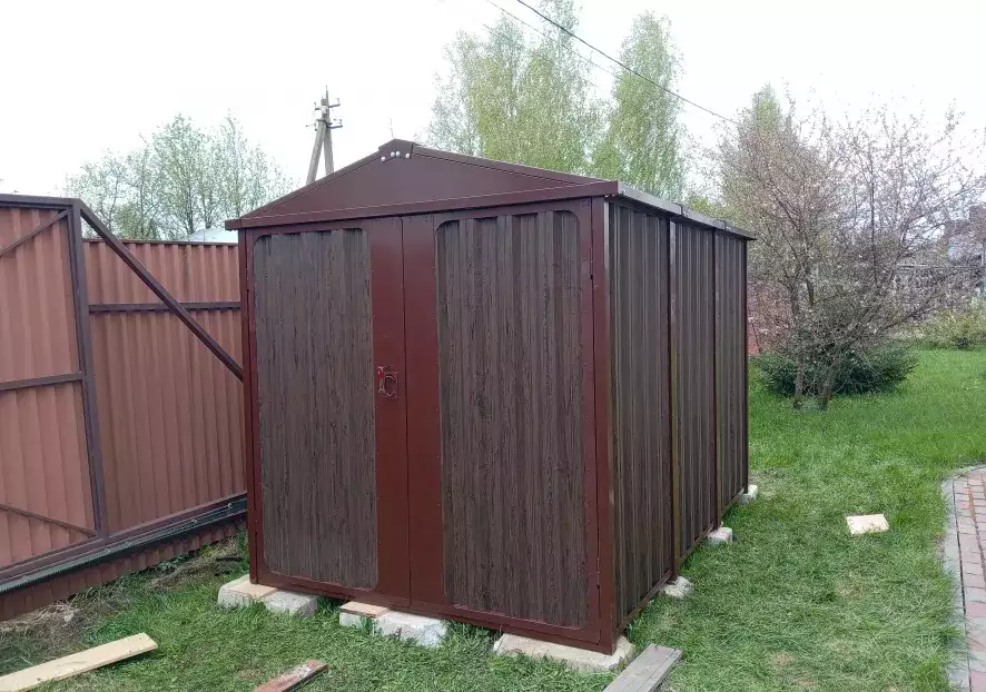 Хозблок SKOOGGY для дачи с отделкой «под дерево»