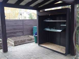 Роллетный шкаф для хранения вещей в серо-коричневом цвете в пос. Пестово, г.о. Мытищи, МО